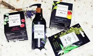Zestaw produktów **botanicapharma**: malinowy peeling, hydrolat lawendowy i maska algowa. Naturalne kosmetyki do pielęgnacji.