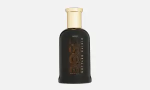 Flakon perfum Hugo Boss Bottled Elixir, ciemnobrązowy, ze złotą nakrętką.